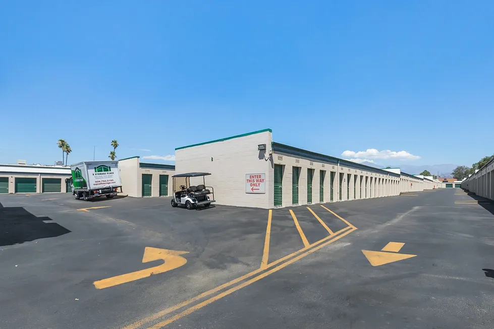 Storage units outside near moving truck.