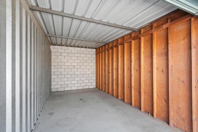 Wooden walled concrete storage unit