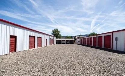 Multiple sizes of outdoor red storage units.