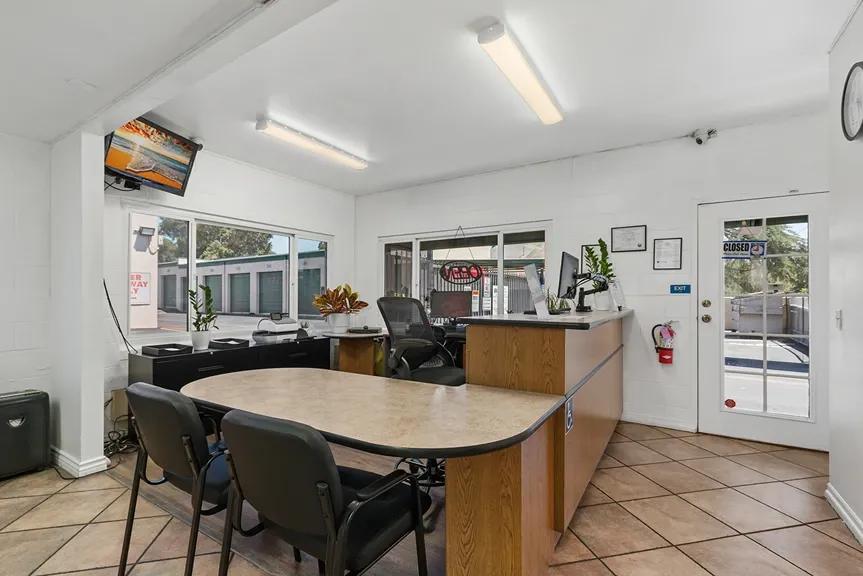 Curved inner desk at a storage facility office.