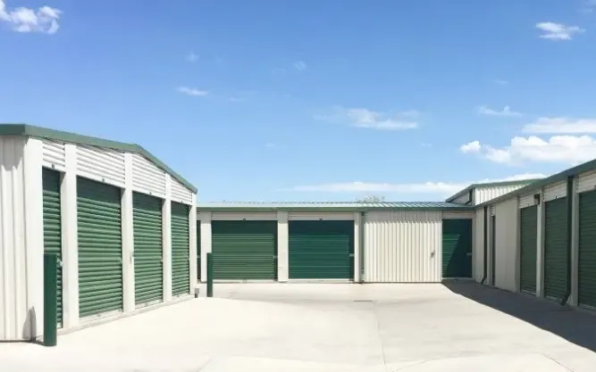 White and green outdoor storage units.
